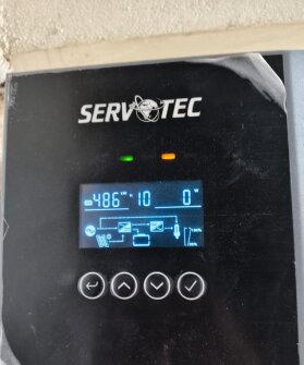 Solar inverter display showing system readings